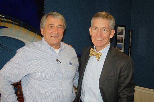 James Bailey Jr., left, today announced the sale of the Financial News & Daily Record to Matt Walsh.