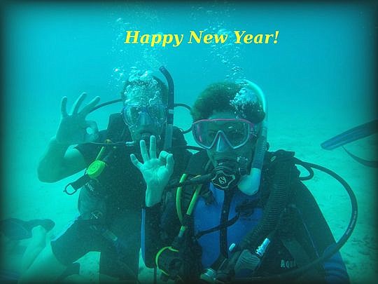 Jeff and Giselle Carson scuba diving in Aruba.