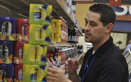 WebcoÂ GeneralÂ PartnershipÂ foodÂ brokerÂ ChrisÂ LenzeÂ linesÂ upÂ productsÂ onÂ theÂ shelvesÂ atÂ Naval Air Station Jacksonville's new commissary, which opens Thursday.