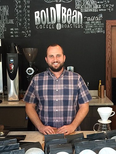 Zack Burnett, at Bold Bean Coffee Roasters' San Marco shop, is managing partner. Starting next week, he'll have an office in a new headquarters space in Center Point Business Park.