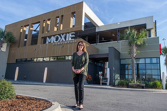 Sarah Marie Johnson outside Moxie Kitchen + Cocktails on the St. Johns Town Center. She was named the JAX Chamber 2017 Small Business Leader of the Year.