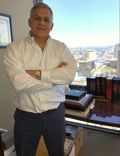 Chip Bachara has a great view of Downtown from his 18th-floor office in the Wells Fargo Center.