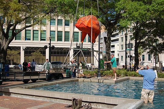 "The Giant Chicken" left its home in Hemming Park and will be in the front yard of Wayne Wood's Riverside home.
