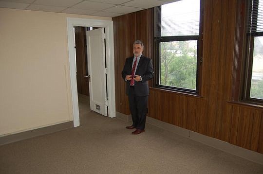 Florida Theatre Performing Arts Center President Numa Saisselin shows one of the offices available for lease on the fourth floor of the historic building Downtown along Forsyth Street.