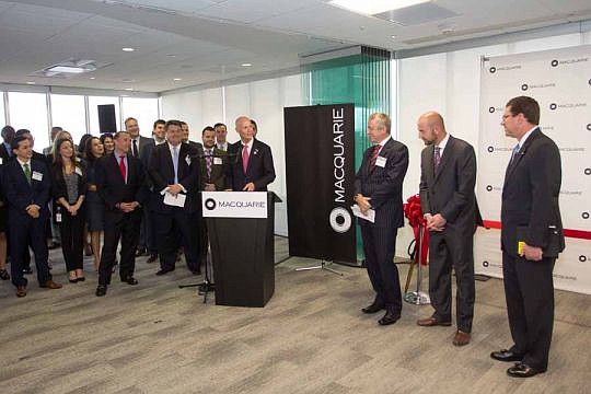 Gov. Rick Scott welcomed Macquarie to Jacksonville as it opened a financial services center in Riverplace Tower on the Downtown Southbank in 2016. It now wants to add 50 jobs with the help of city and state incentives.