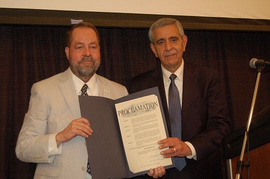 Attorney Bill Brinton, left, and city Chief Administrative Officer Sam Mousa, who presented to Brinton a proclamation from Mayor Lenny Curry declaring Wednesday "Bill Brinton Day" in Jacksonville.