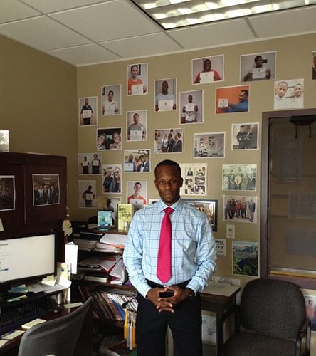 Terry Powell, City Re-entry Programs coordinator and Developing Adults with Necessary Skills class instructor, displays in his office photographs of students who have earned high school diplomas through the adult education program for inmates at the p...