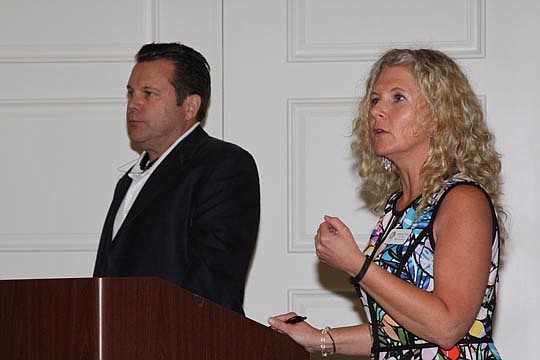 Eddie Hilliard, president of the Florida Association of Mortgage Professionals, and Michelle Glass, president of the Mortgage Bankers Association of Jacksonville, lead a joint meeting and luncheon that included a panel discussion of upcoming changes t...