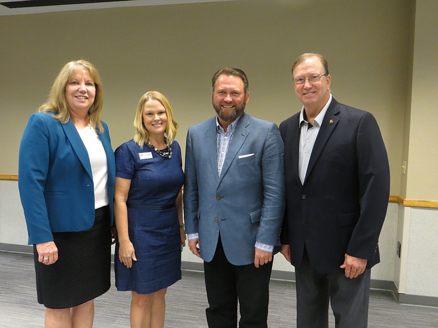Janet Morris, Raydient Places + Properties marketing manager; Carrie Budds, Northeast Florida Builders Association Sales &amp; Marketing Council board member and imortgage loan consultant; Charles Adams, Raydient Places + Properties vice president of ...