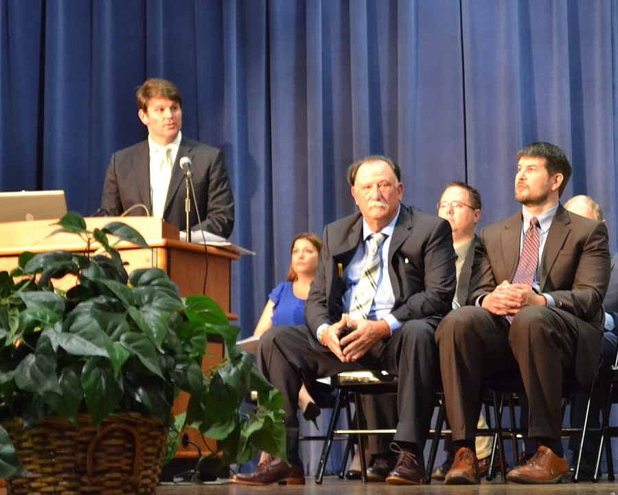 Chris Dostie, NEFBA vice president, addresses the 2017 graduating class as Christina Thomas, Keith Ward and  NEFBA Executive Director Corey Deal look on.