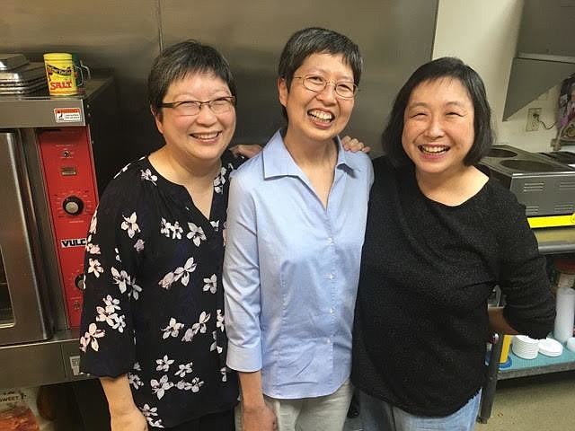 From left, sisters Paige, Tram and Rachele Nguyen are three of five sisters who operate Oizeo5 catering. Four of the five left behind their college degrees to start a family-run business.