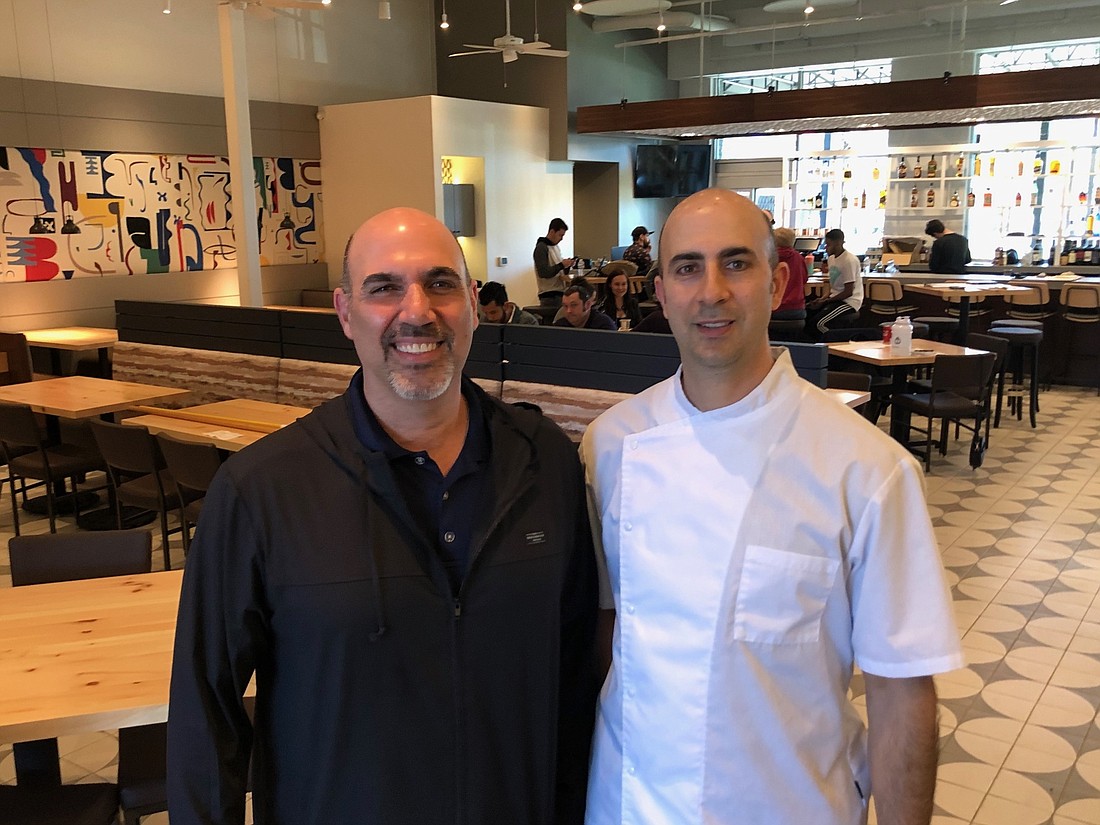 Chefs and owners Matthew and David Medure at Midtown Table in Gateway Village at Town Center.