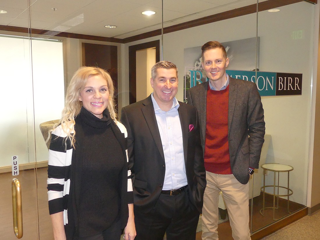 From left, Jimerson Birr Director of Marketing Anne Markstroem, the law firmâ€™s managing partner, Charles Jimerson, and Nikos Westmoreland, director of business development.