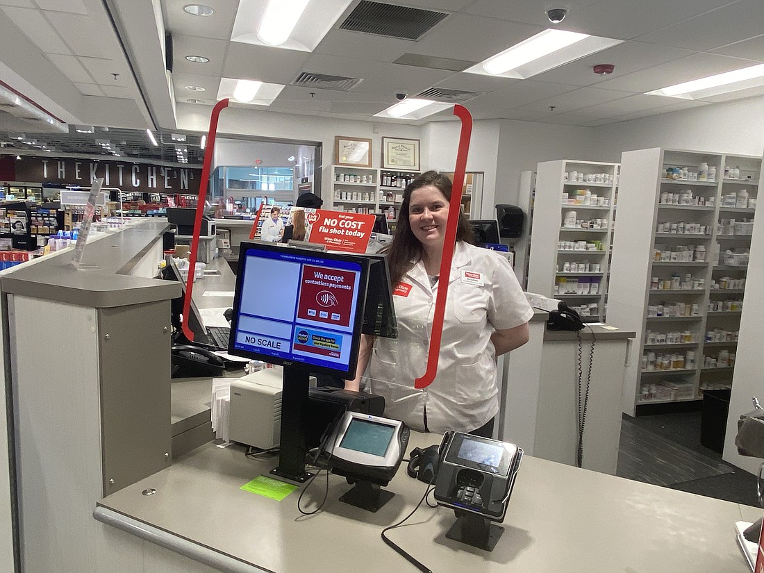 Protective partitions are being installed in pharmacies, checkout lines, liquor store counters and customer service areas at Winn-Dixie and Harveys Supermarket locations.