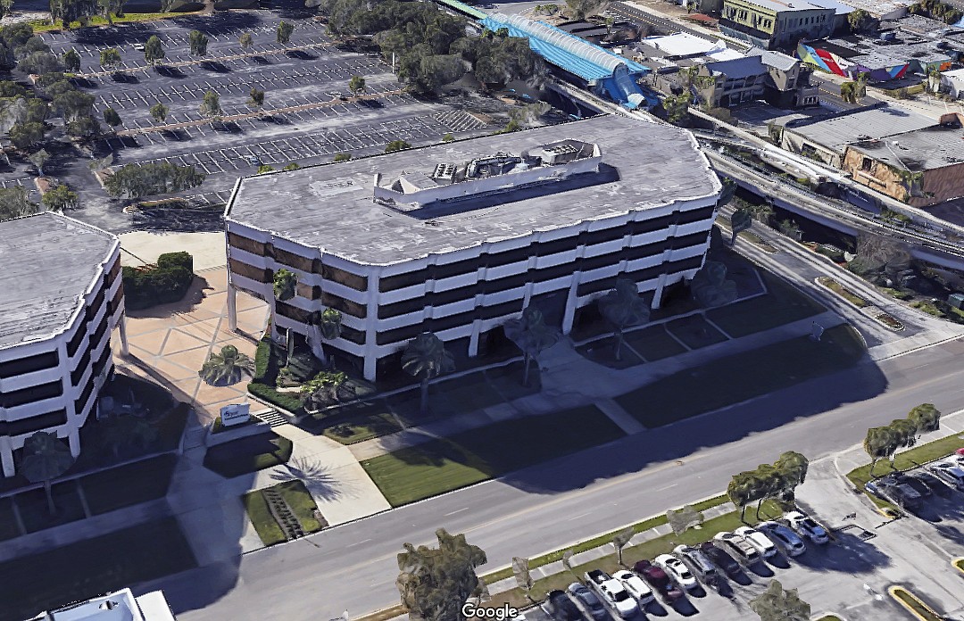 Development notes Baptist Health to add parking; Caliber Collision to