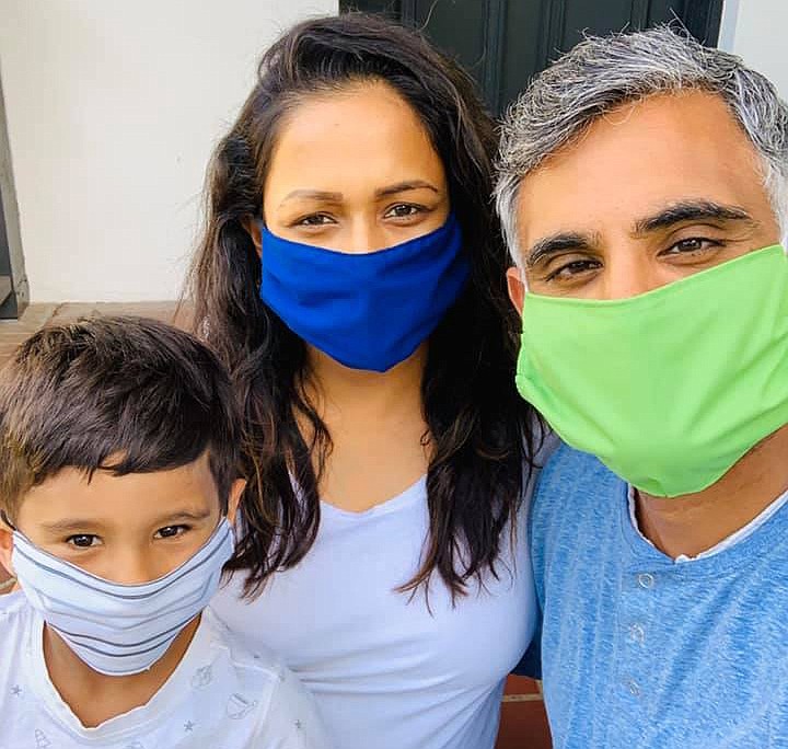Dr. Saumil Oza (right) and his wife and son wearing masks.