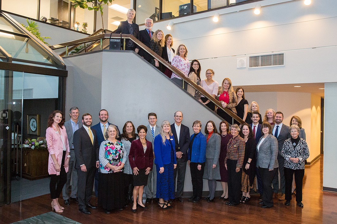 The Marks Gray team gathered for a group photo Nov. 14, the law firmâ€™s 120th anniversary. With anticipated permanent social distancing policies, they may not again be this close to each other in the office.
