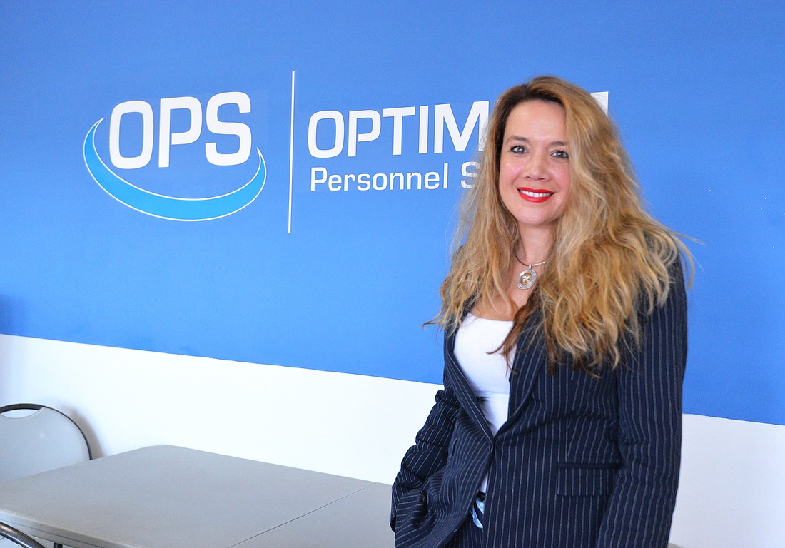 Krista Smith launched Optimum Personnel Services in 2013. She credits her clients for teaching her â€œessentially how to do my job.â€ (Photo by Dede Smith)
