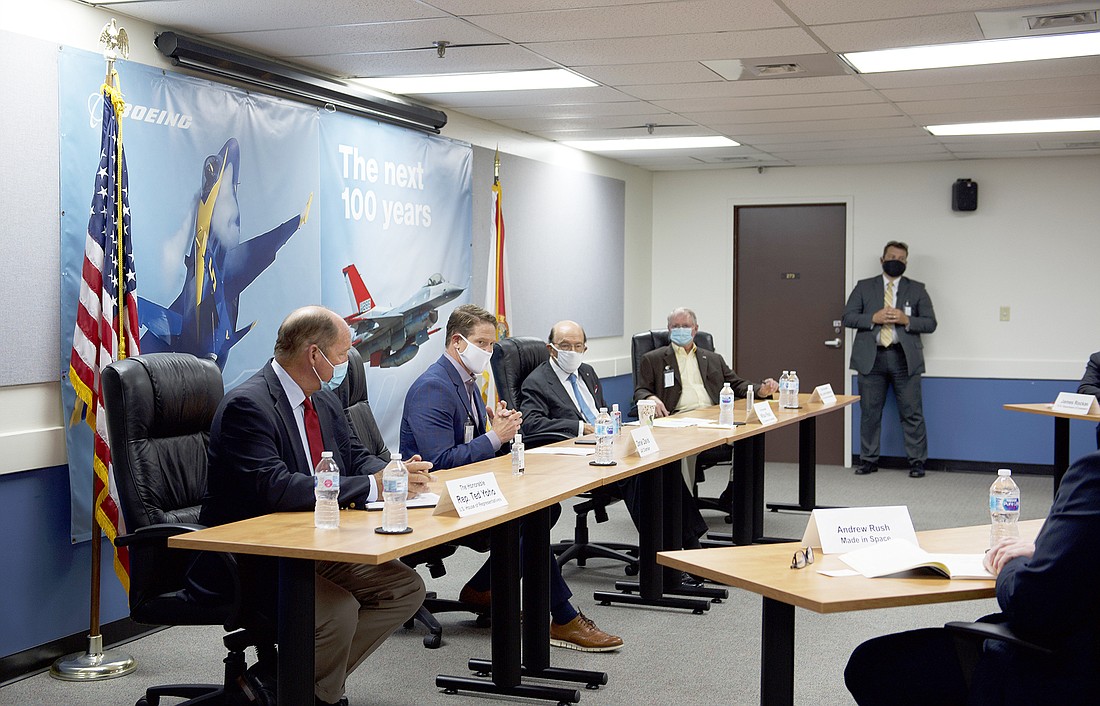 From left, U.S. Rep. Ted Yoho, JAX Chamber CEO Daniel Davis, U.S. Secretary of Commerce Wilbur Ross and U.S. Rep. John Rutherford take part in a  roundtable discussion June 12 at Boeingâ€™s facility at Cecil Airport. (Boeing
