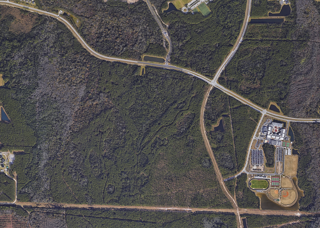The property property is at the southwest, northeast and northwest quadrants of Longleaf Pine Parkway and Veterans Parkway.  It is west and north of Creekside High School.