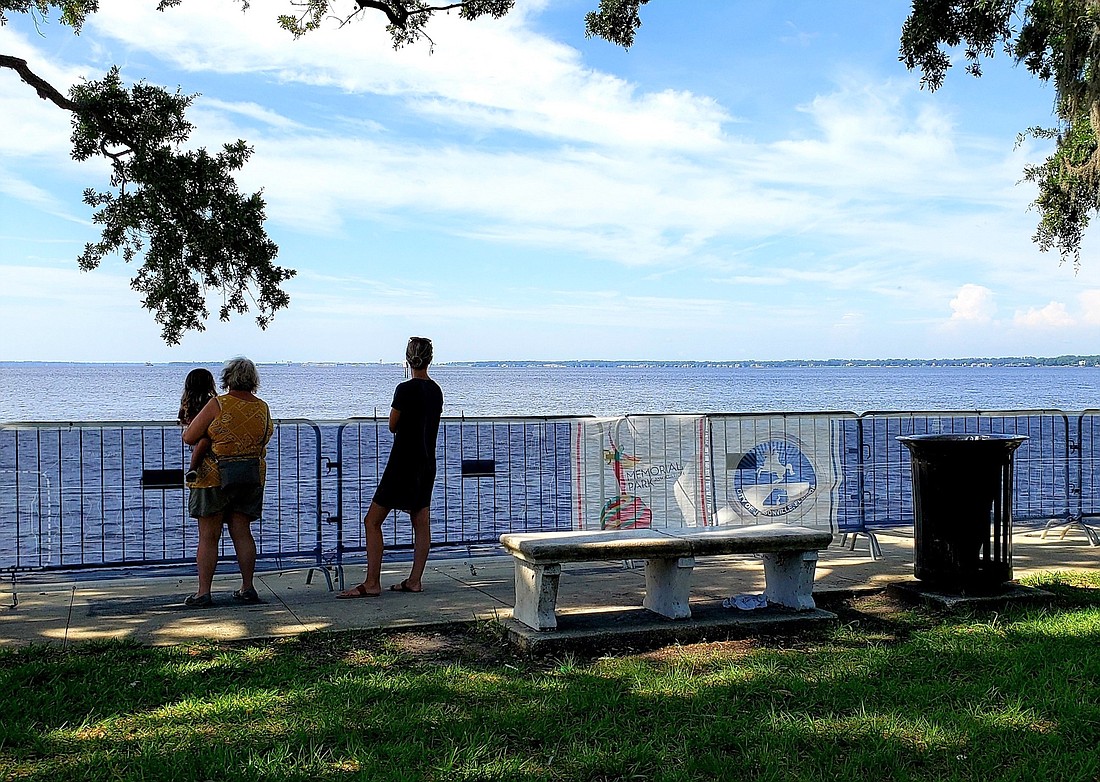 The temporary safety barrier installed after Hurricane Irma along the St. Johns River at Memorial Park will be replaced with a restored historically accurate concrete balustrade.