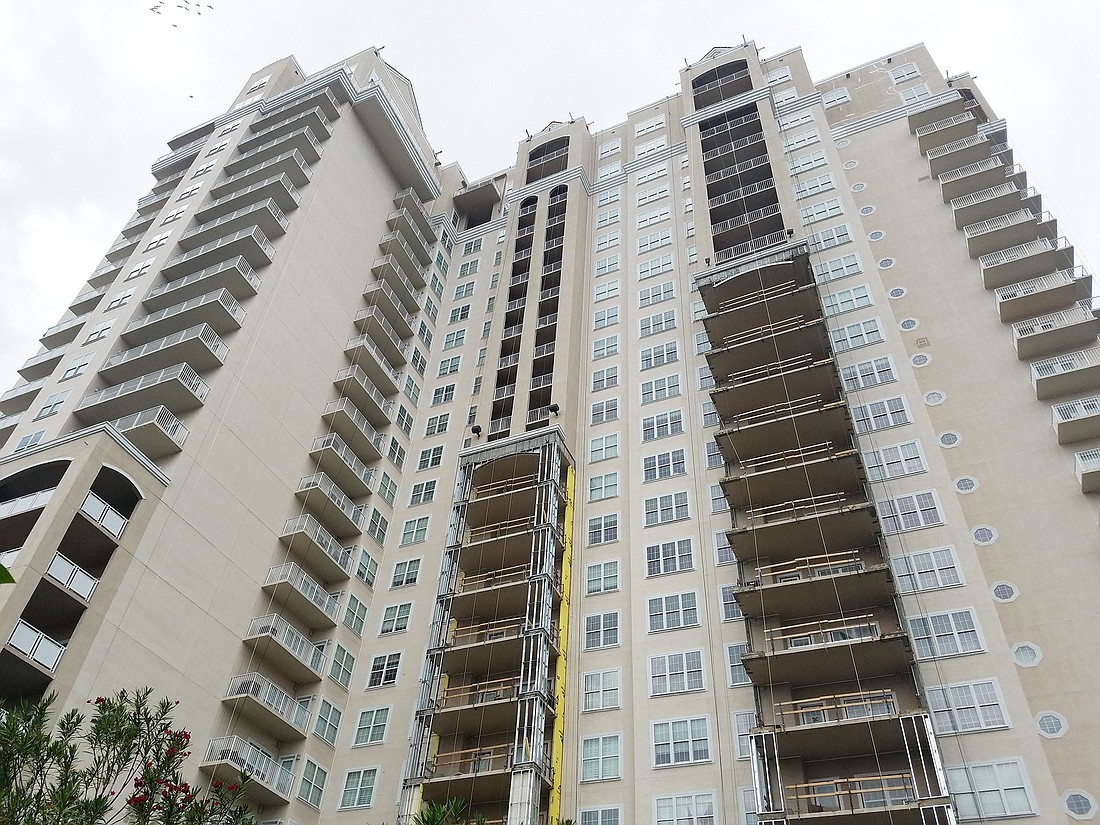 Scaffolding is up at The Plaza Condominium high-rise at 400 E. Bay St. for exterior stucco repairs.