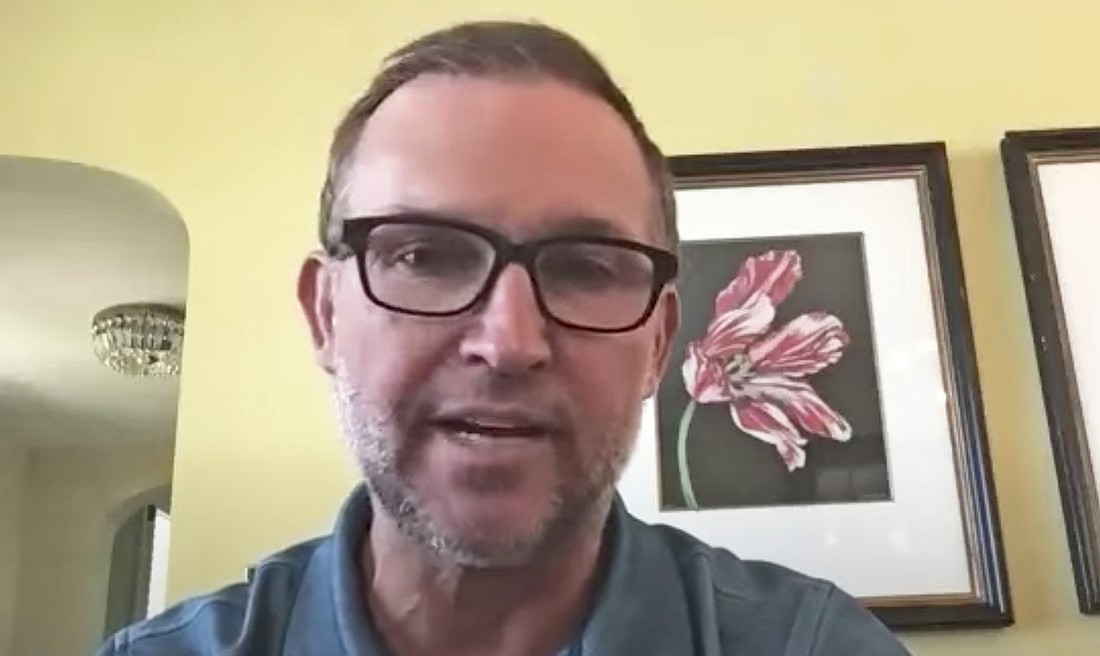 Jacksonville Mayor Lenny Curry conducts his virtual news conference from his home June 7.