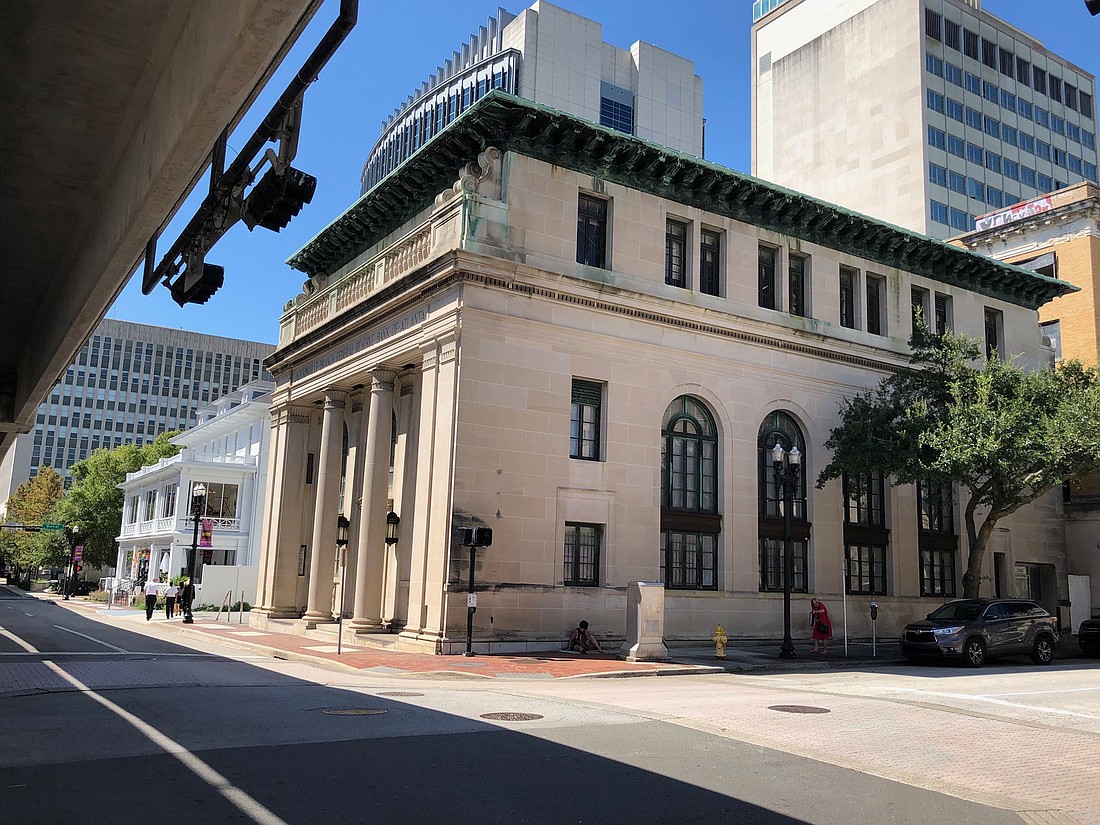 JWB Real Estate bought the Federal Reserve Bank Building at 424 N. Hogan St., next to the Seminole Building it bought in January.