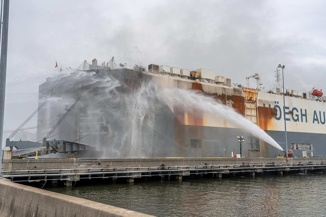 The HÃ¶egh Xiamen cargo ship caught fire at Blount Island on June 4 and smoldered for eight days. Ten firefighters who were injured in an explosion aboard the vessel have filed a lawsuit in Circuit Court in Jacksonville.