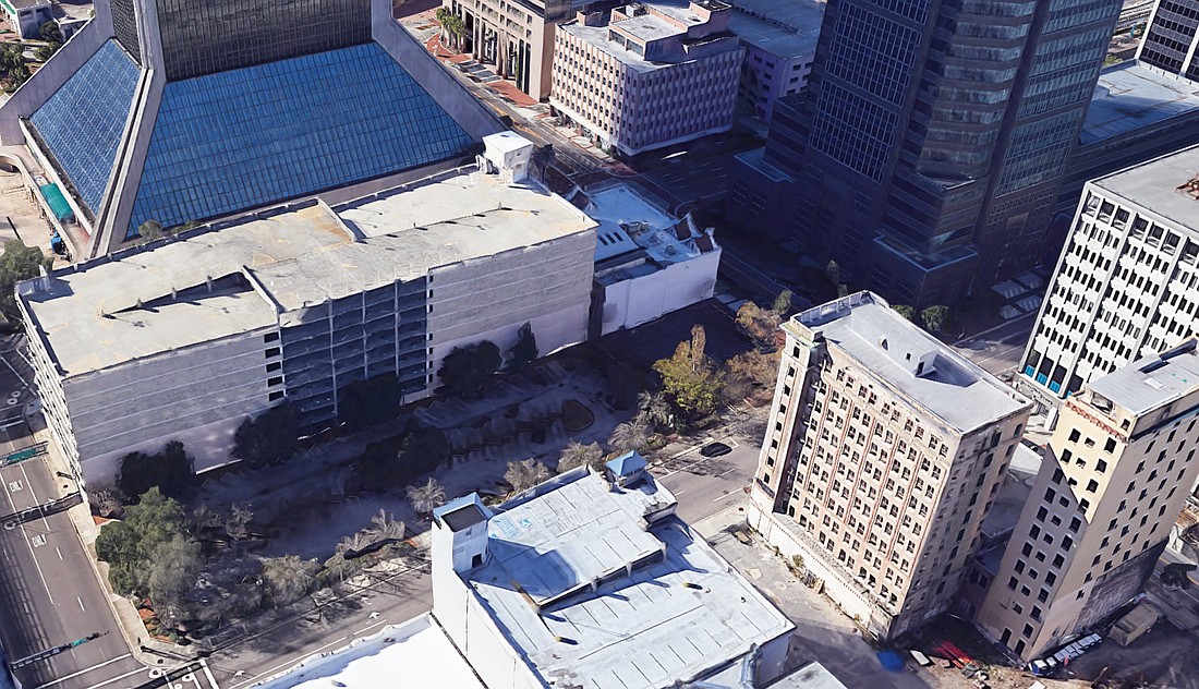VyStar could expand its proposed parking garage to the space adjacent to Regions Bank at 54 W. Forsyth St. (Google)