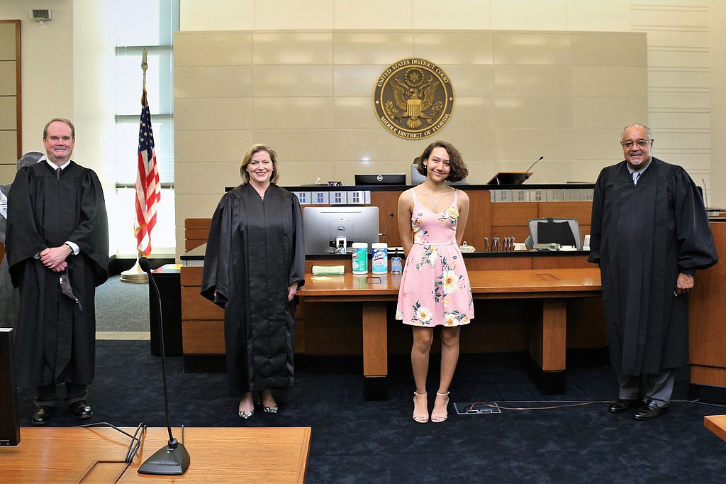 From left, Chief U.S District Judge Timothy Corrigan; U.S. District Judge Marcia Morales Howard; 2020 High School Essay Contest winner Michelle Acosta; and U.S. District Judge Brian Davis.