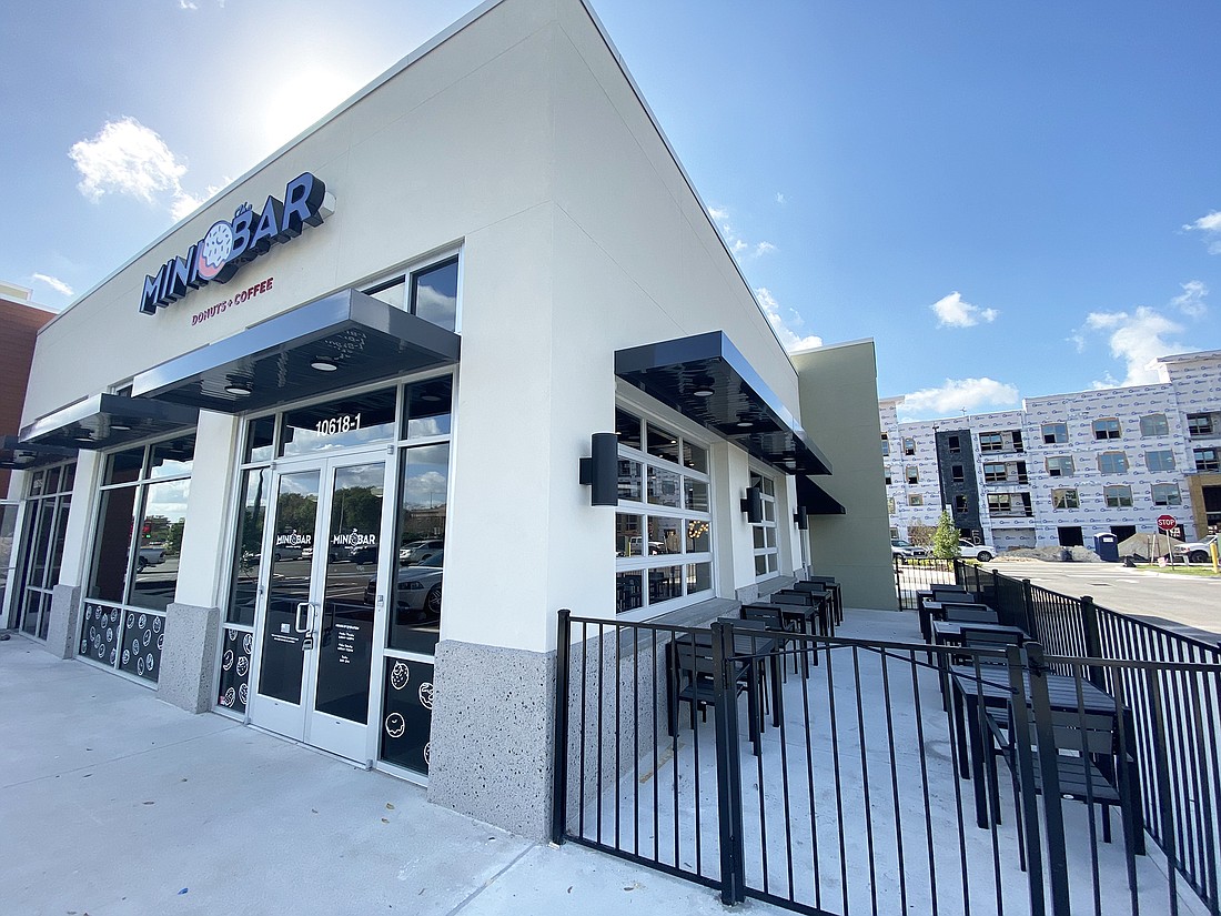Tenants include of the Gateway Village at Town Center building include The Mini Bar Donuts + Coffee, Tropical Smoothie Cafe, Great Clips and Insite Radiology.