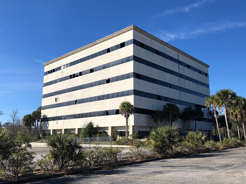 The former FBI building in Arlington is slated for conversion into 118 apartments.