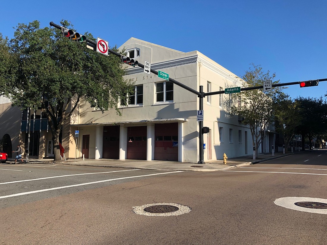 The historic Central Fire Station at 39 E. Adams St. and its oak tree were debated by the Downtown Development Review Board.