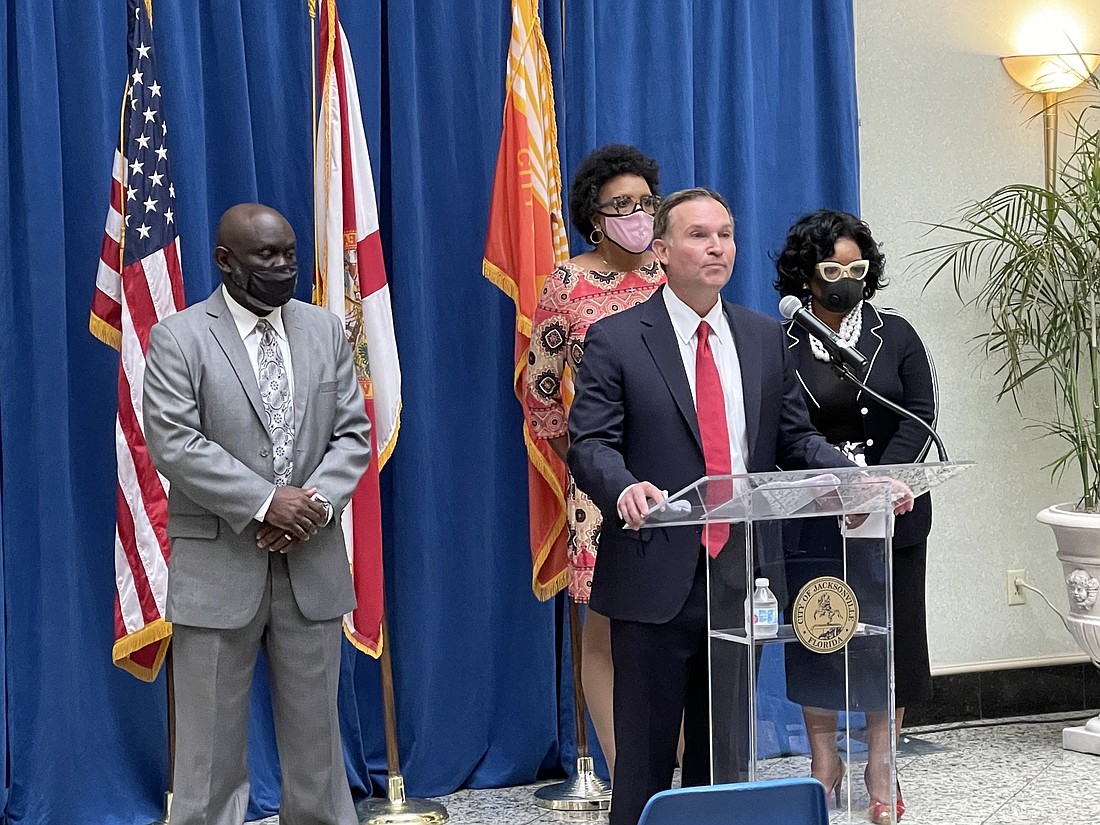 Mayor Lenny Curry speaks Feb. 11 at City Hall backed by Council Vice President Sam Newby and Council members Brenda Priestly Jackson and Juâ€™Coby Pittman.