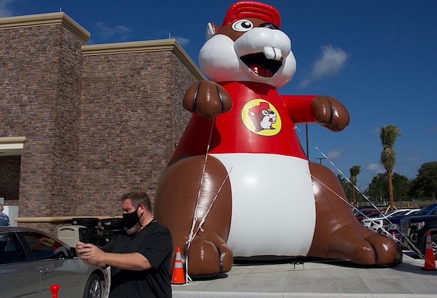 Jax Daily Record Photo A man takes a selfie with the inflatable