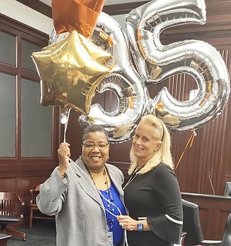 Judicial Assistant Audrey Ivory and Duval County Judge Kimberly Sadler at Ivoryâ€™s retirement celebration March 31 at the Duval County Courthouse.