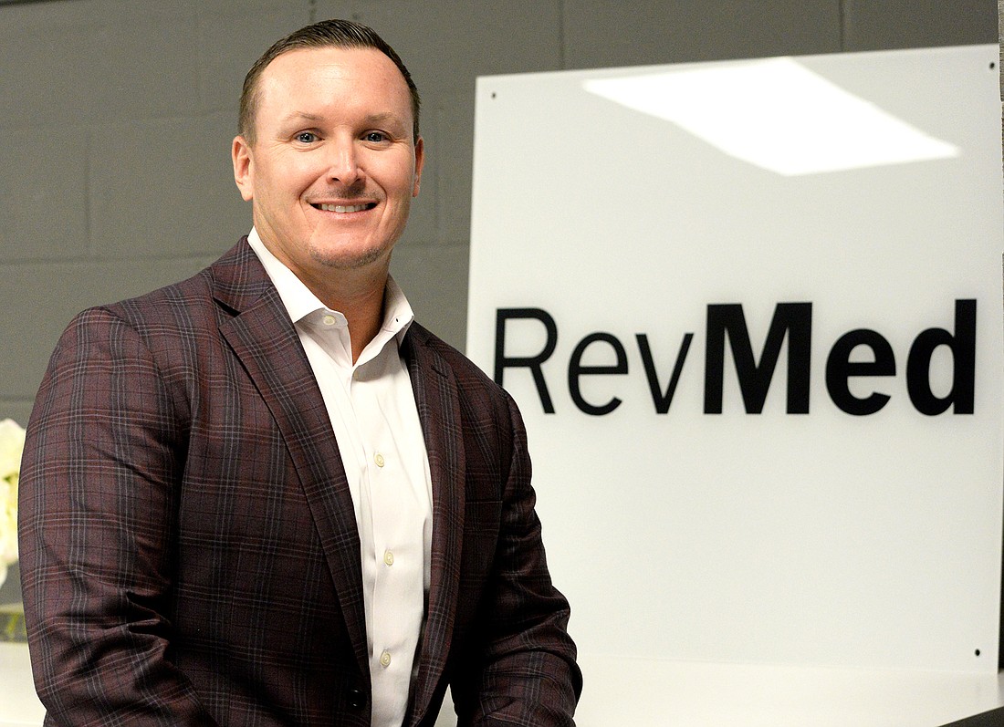 Scott Revels started RevMed Group in 2016 with business partner Luke McCann. The company now works with about 500 private practices across the country. (Photos by Dede Smith)