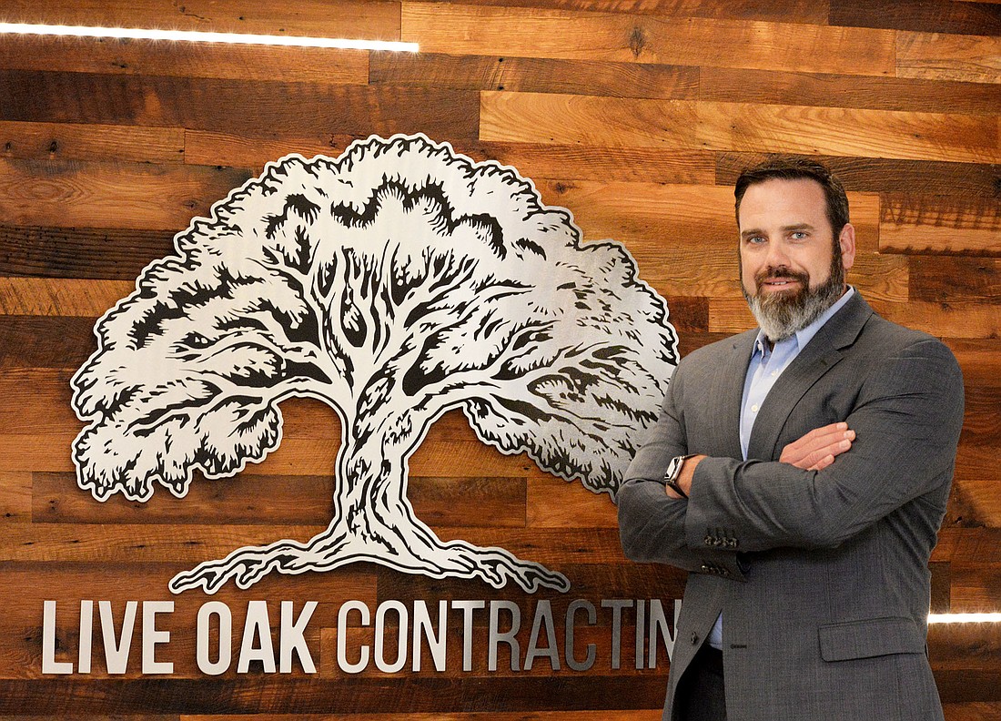Live Oak Contracting founder Paul Bertozzi says growing a business is a team effort. â€œItâ€™s really everybody contributing,â€ he said. (Photos by Dede Smith)