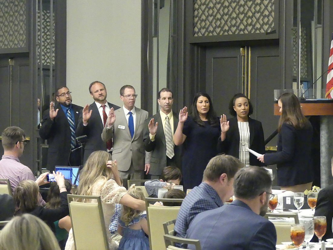 State Attorney General Ashley Moody swore in the 2021-22 JBAÂ board of governors June 9. From left, David Thompson, John Weedon, Brian Coughlin, Blane McCarthy, Jamie Karpman, YLS 2021-22 President Cassie Smith and Moody.