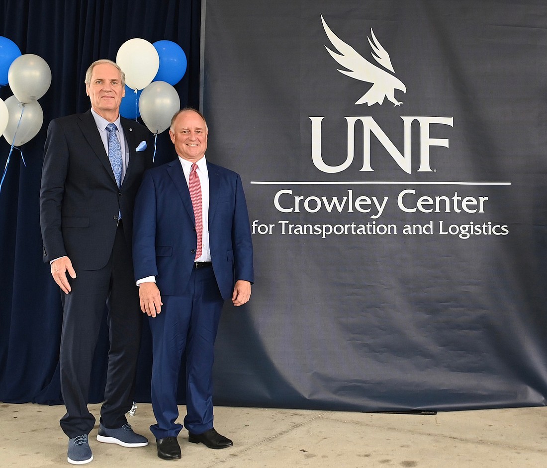 University of North Florida President David Szymanski, left, and Tom Crowley, Crowley Maritime Corp. CEO and chairman.