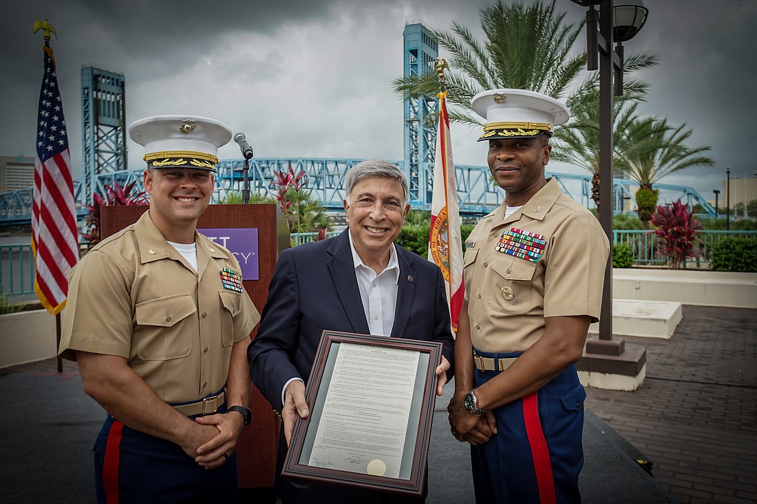 From left, U.S. Marine Corps Maj. Ken Greer, City Council President Tommy Hazouri and Col. Riccoh Player.
