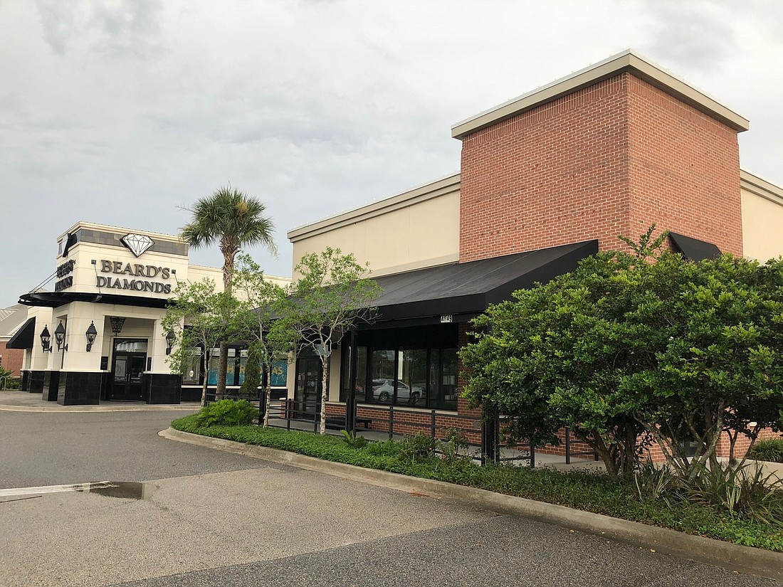 The closed Pei Wei Asian Kitchen at 4849 Town Center Parkway in The Markets at Town Center could be converted for Buff City Soap.