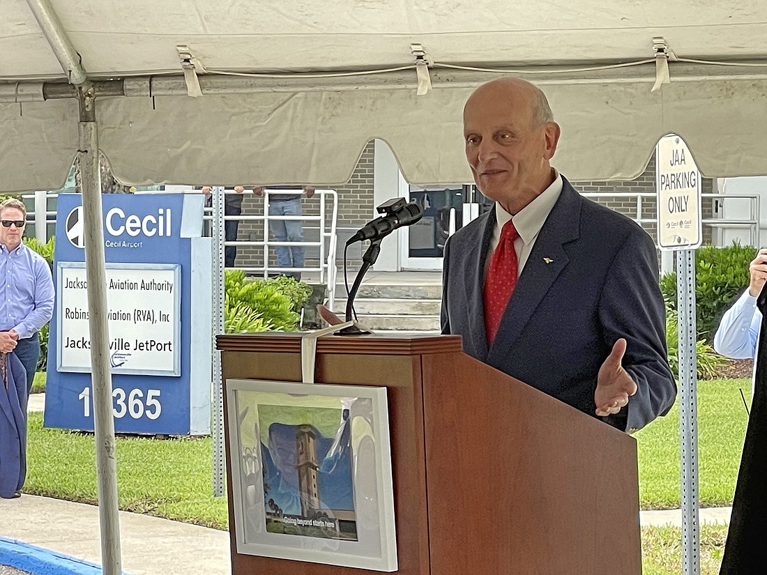 Jacksonville native and astronaut Dr. Norman Thagard speaks at the Cecil Spaceport opening ceremony July 27.