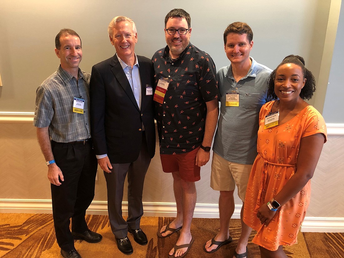 From left, JBA Treasurer Blane McCarthy, The Florida Bar President Mike Tanner, JBA Executive Director Craig Shoup, YLS President-elect James Poindexter and YLS President Cassie Smith at the Voluntary Bar Leaders Conference.