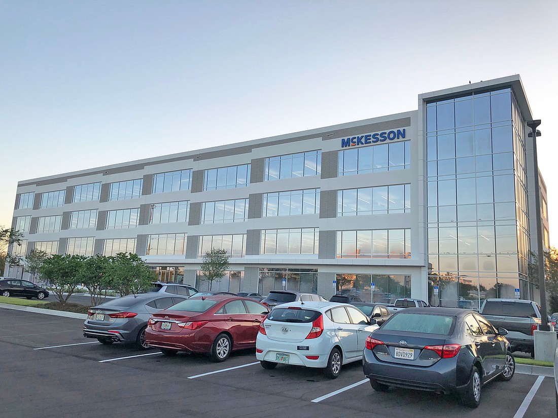 The four-story, 120,407-square-foot building at 6551 Gate Parkway is fully leased to McKesson Corp.