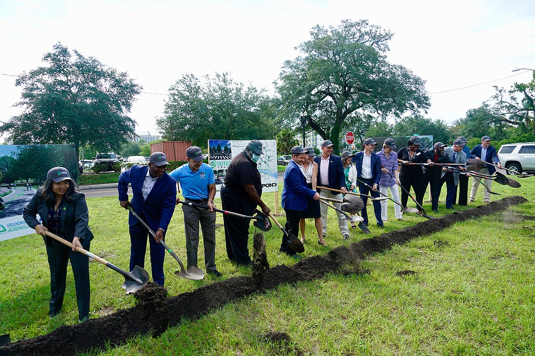 Mayor Lenny Curry, Groundwork Jacksonville CEO Kay Ehas, corporate donors and city officials take part in the Emerald Trail groundbreaking Aug. 24.