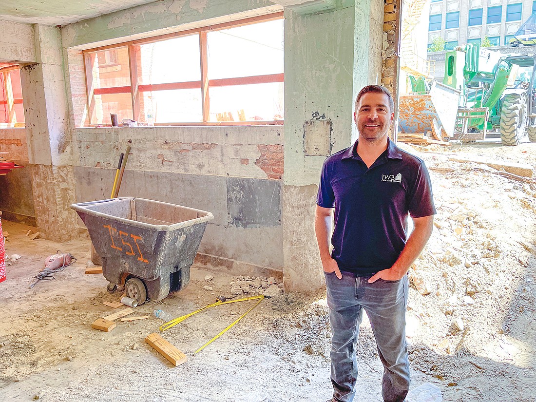 JWB President Alex Sifakis inside the Florida Baptist Convention building at 218 W. Church St. that is being transformed into apartments, restaurant and retail space.