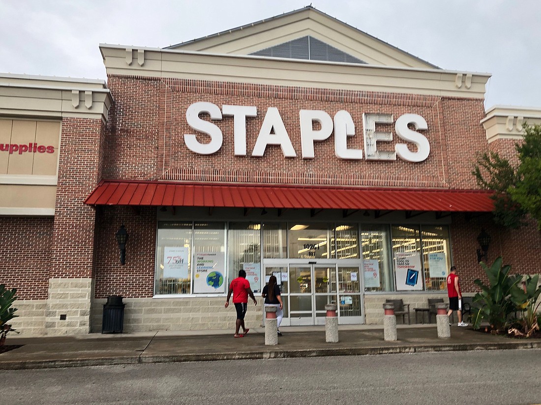 The closed Staples at 10261 River Marsh Drive.