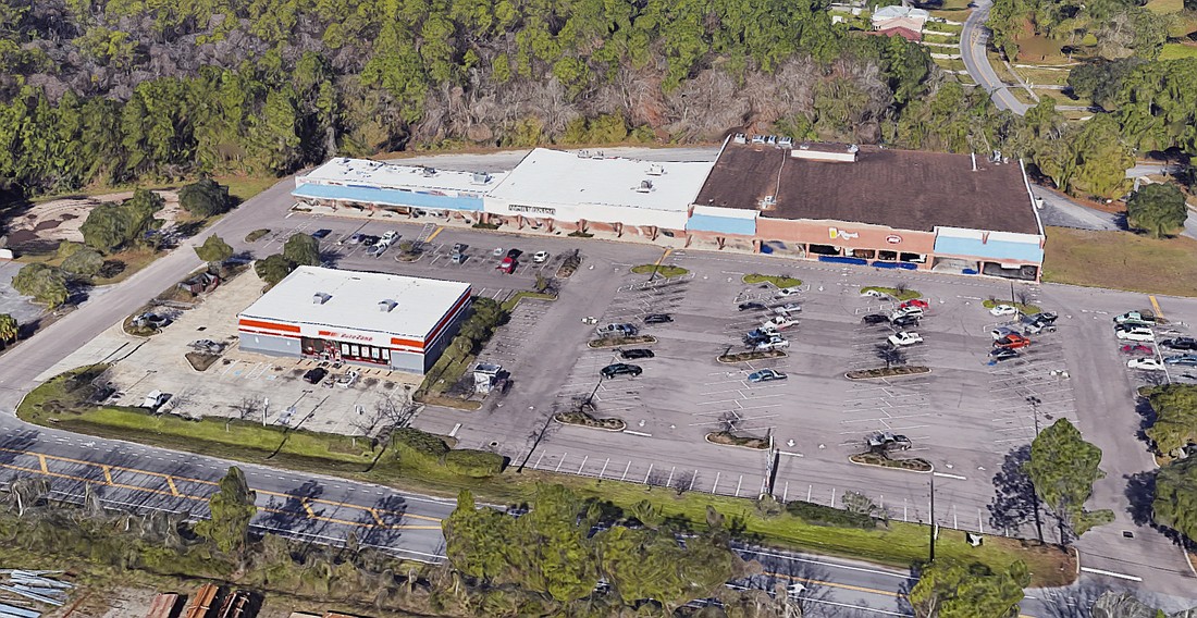 The Marietta Square Shopping Center at 8299 W. Beaver St. sold for $5.75 million.
